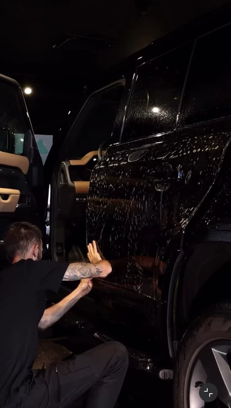 Brilliant Garage technician applying PPF to a vehicle