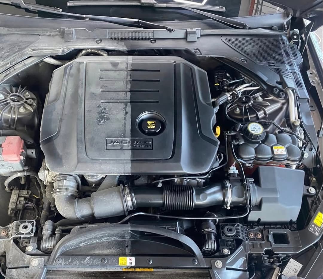 Jaguar engine bay, before and after cleaning split
