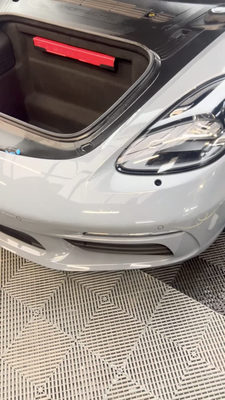 Porsche 718 in grey, front end with frunk open
