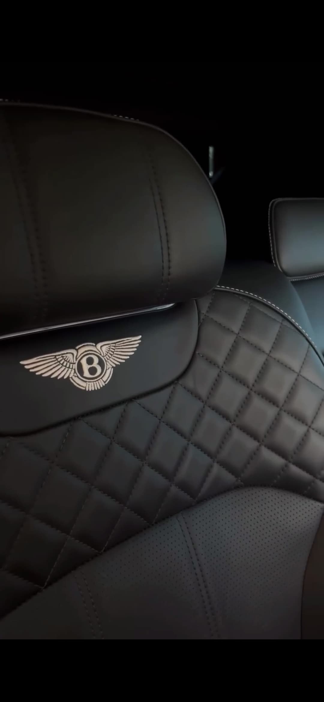 Bentley headrest badge close-up