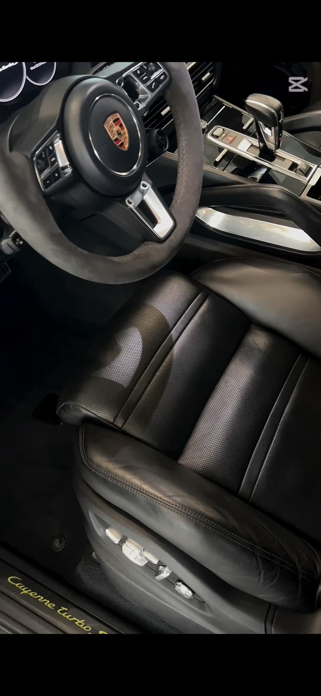 Porsche Cayenne steering wheel and seat detail