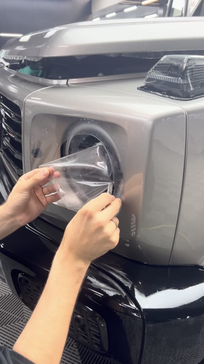Protection film fitted over a G-Class headlight