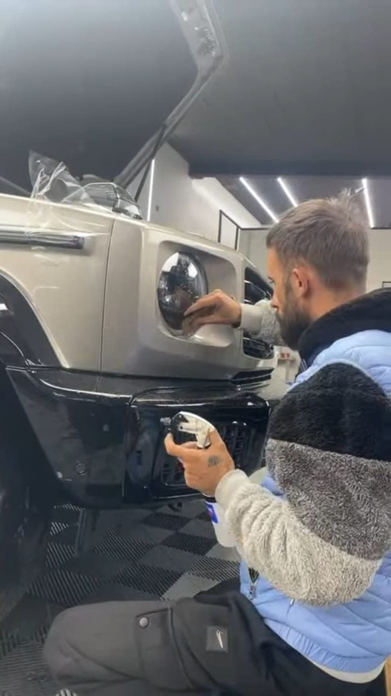 Spraying slip solution before film application on a G-Class