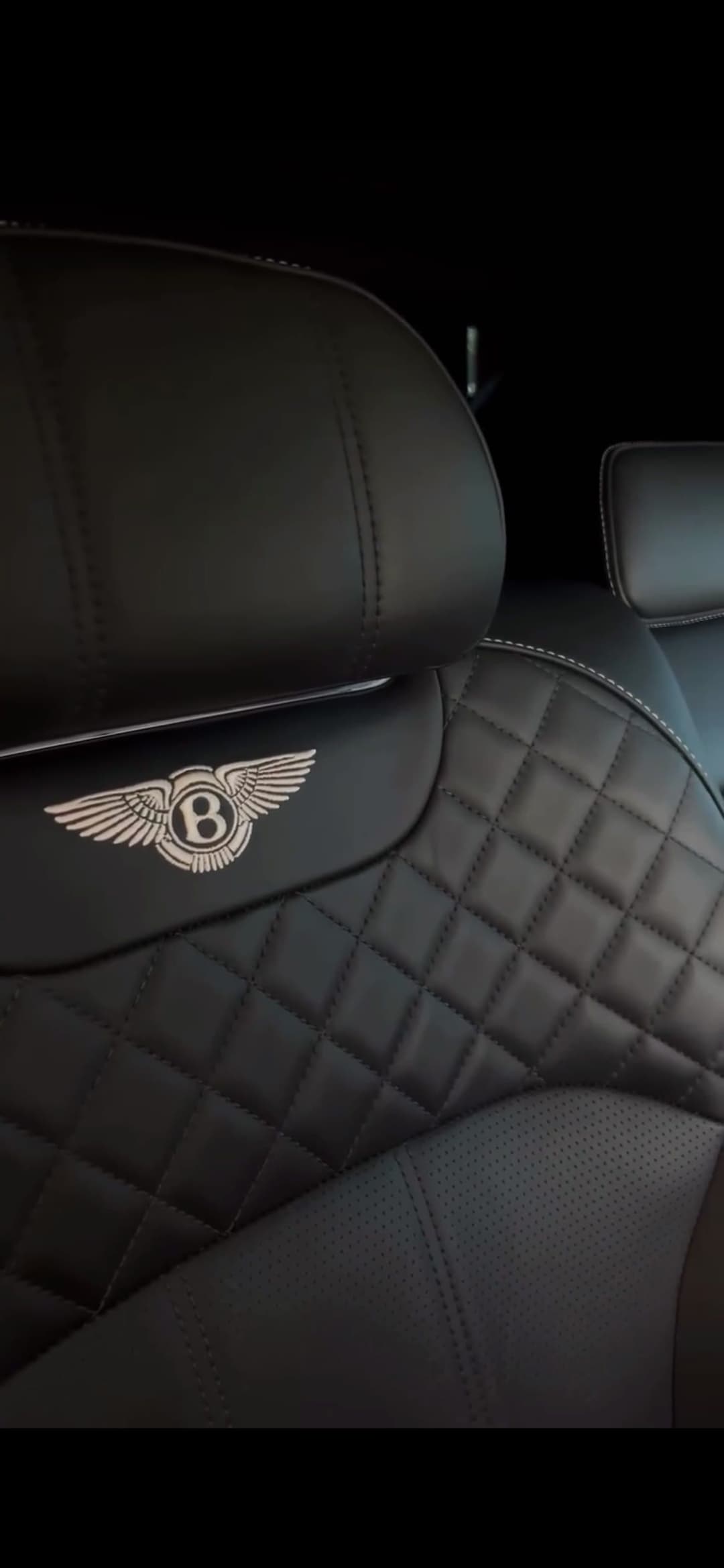 Bentley headrest badge close-up