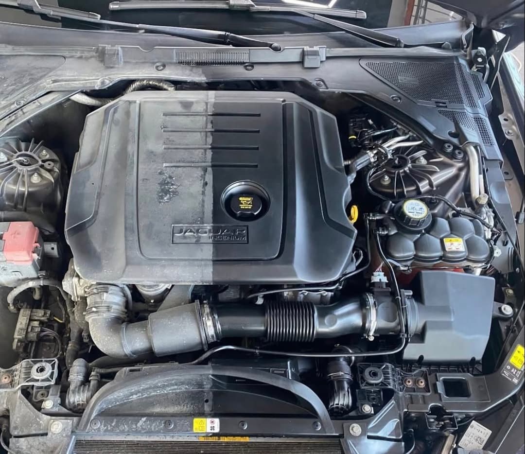 Jaguar engine bay, before and after cleaning split